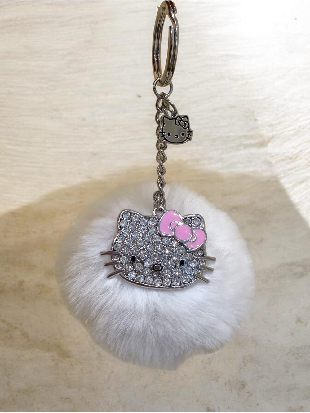 Hello Kitty White Faux Fur Pom with Pink Bow and Rhinestone Face Keychain